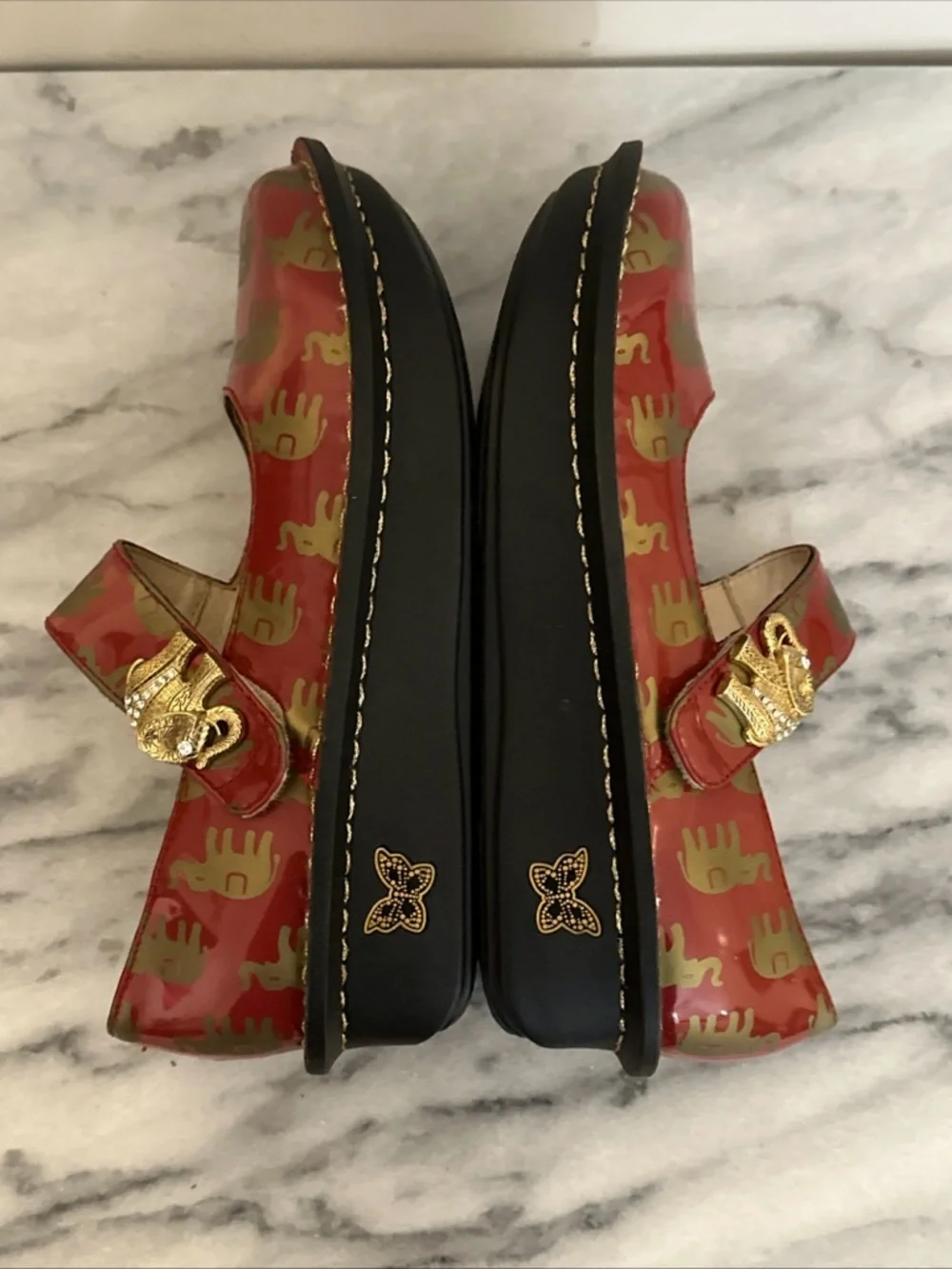 Alegria patent Red leather Mary Jane Platforms with Gold Elephant Accents